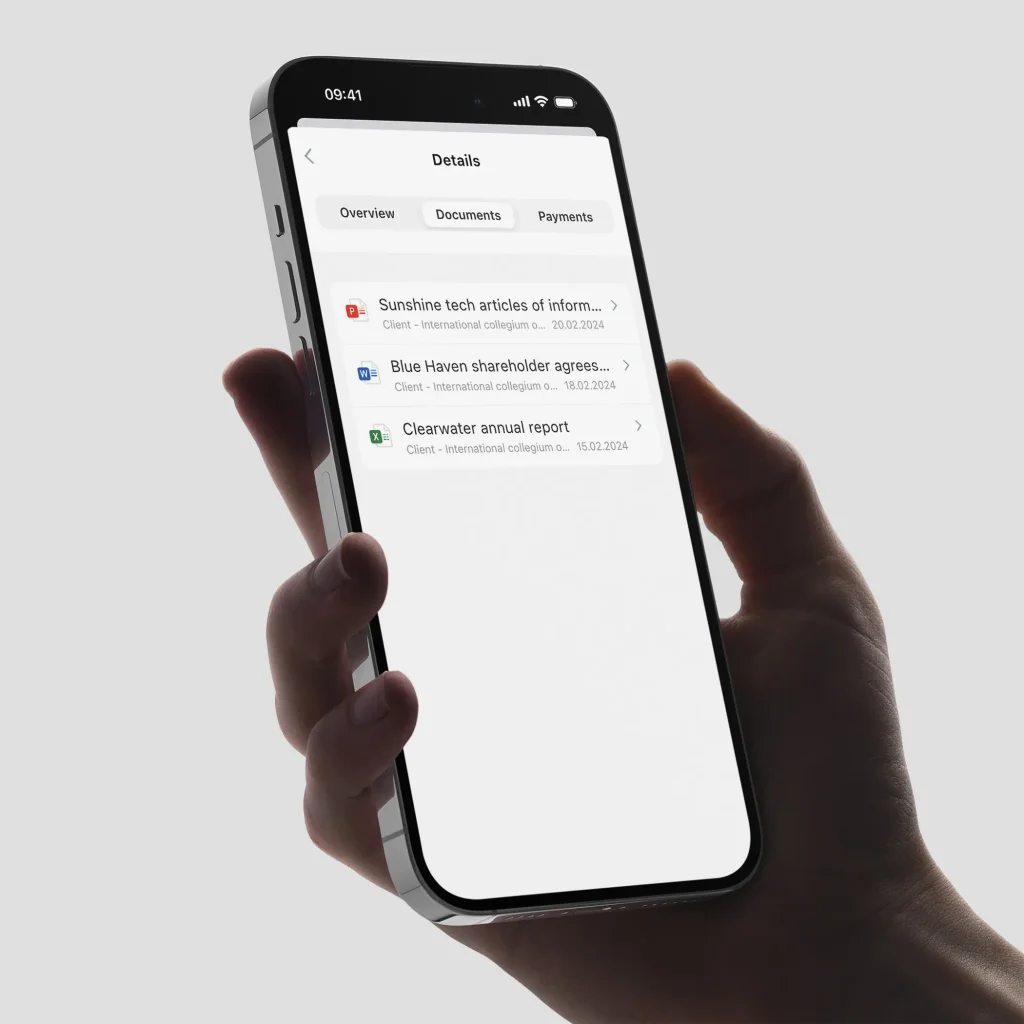 Hand holding an iPhone 15 Pro displaying Jusnote app's invoicing module, showcasing document lists, designed by Smotrow Design, Head of Design - Nikita Smotrov
