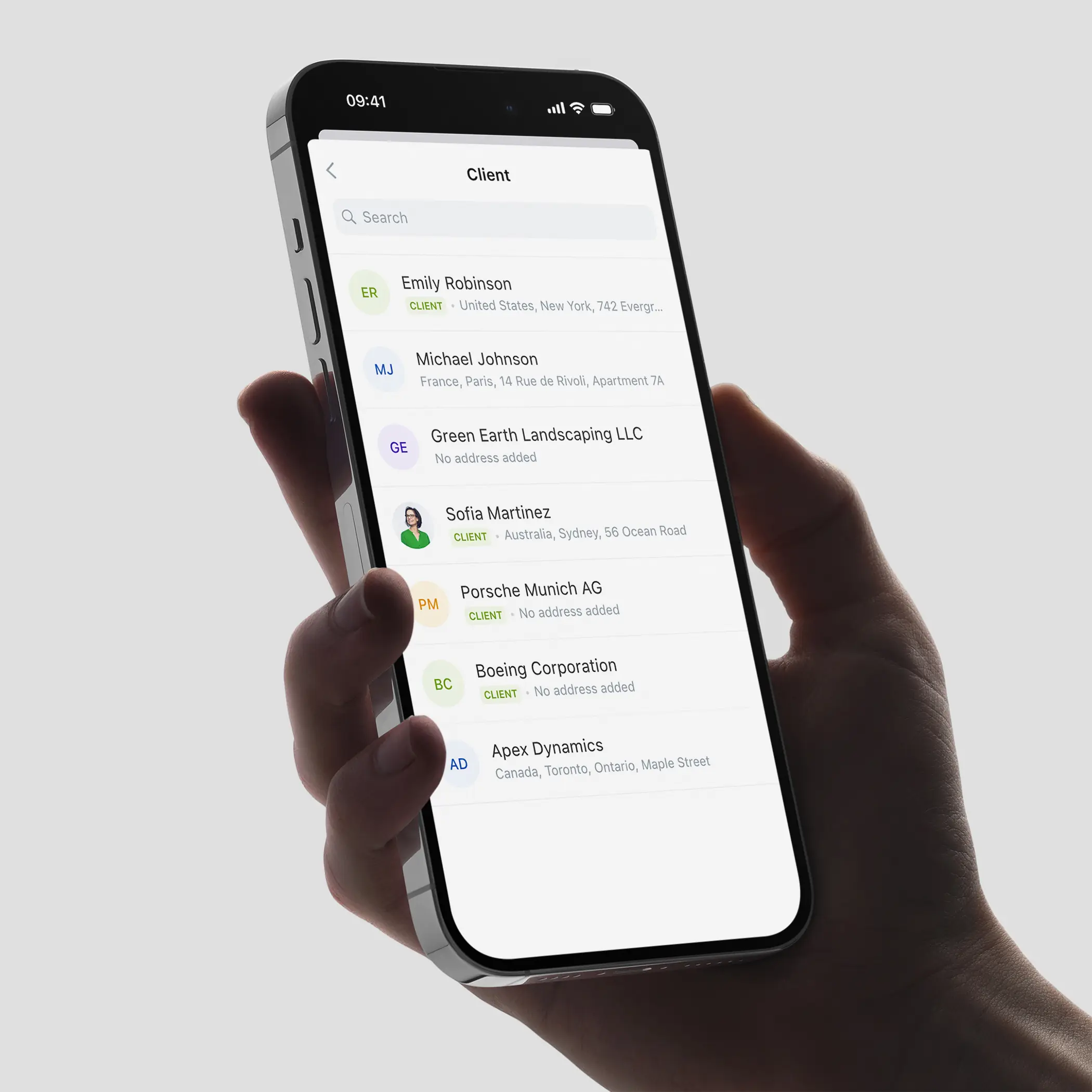 An iPhone 15 Pro displaying the Jusnote new invoicing module with a list of clients (contacts) designed by Smotrow Design, a clean and organized layout, minimal user interface, elegant design.